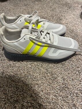 adidas Neutral Gray Sneakers with Neon Yellow Stripes